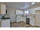 Newly renovated kitchen, featuring white shaker cabinets, quartz countertops and stainless steel appliances at 3225 Crawford St, North Las Vegas, NV 89030