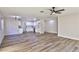 Open living room with wood-look floors at 3225 Crawford St, North Las Vegas, NV 89030