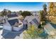 An aerial shot showcasing a house with a driveway and spacious backyard at 332 Oakford St, Las Vegas, NV 89110