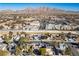 Aerial view of houses and landscape with mountain backdrop at 332 Oakford St, Las Vegas, NV 89110