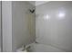 Bathroom features shower and tub with tiled walls at 332 Oakford St, Las Vegas, NV 89110