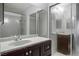 Bathroom with dark vanity and shower/tub combo at 332 Oakford St, Las Vegas, NV 89110