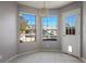 Bright breakfast nook features tile floor and window views at 332 Oakford St, Las Vegas, NV 89110