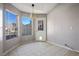 Bright breakfast nook with tile flooring and view of backyard at 332 Oakford St, Las Vegas, NV 89110