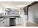 Kitchen with stainless steel dishwasher and breakfast bar at 332 Oakford St, Las Vegas, NV 89110