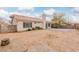 Spacious backyard featuring a patio and gravel area at 3606 Altar Rock Ln, North Las Vegas, NV 89032