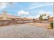 Backyard with a large patio and gravel landscaping at 3606 Altar Rock Ln, North Las Vegas, NV 89032