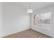 Simple dining room with neutral carpet and a large window at 3606 Altar Rock Ln, North Las Vegas, NV 89032