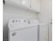 Practical laundry room with Whirlpool washer and dryer at 3606 Altar Rock Ln, North Las Vegas, NV 89032