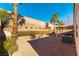 Backyard with covered patio and gravel landscaping at 3728 Discovery Creek Ave, North Las Vegas, NV 89031