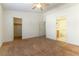 Primary bedroom with private bathroom access and walk-in closet at 3728 Discovery Creek Ave, North Las Vegas, NV 89031