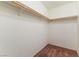 Large closet with double hanging rods and neutral walls at 3728 Discovery Creek Ave, North Las Vegas, NV 89031