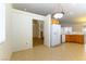 Bright dining area with a view into the kitchen and living room at 3728 Discovery Creek Ave, North Las Vegas, NV 89031