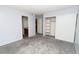 Bedroom featuring plush carpeting, large closet, and attached bathroom at 3790 Desert Marina Dr # 147, Laughlin, NV 89029