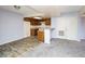 Open concept living room showcasing the kitchen, light paint, and carpet at 3790 Desert Marina Dr # 147, Laughlin, NV 89029