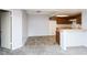 Open concept living room showcasing the kitchen, light paint, and flooring at 3790 Desert Marina Dr # 147, Laughlin, NV 89029