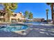 Community pool and spa with surrounding lounge chairs at 3790 Desert Marina Dr # 147, Laughlin, NV 89029