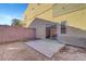 Private backyard with small patio and block wall at 3929 Pepper Thorn Ave # 101, North Las Vegas, NV 89081