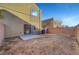 Small, fenced backyard with patio and space for gardening at 3929 Pepper Thorn Ave # 101, North Las Vegas, NV 89081