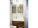 Bathroom with single sink vanity and large mirror at 3937 S Torrey Pines Dr, Las Vegas, NV 89103