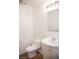 Clean and updated half bathroom with white vanity at 3937 S Torrey Pines Dr, Las Vegas, NV 89103