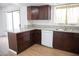 Modern kitchen with granite countertops and wood cabinets at 3937 S Torrey Pines Dr, Las Vegas, NV 89103