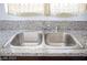 Stainless steel double sink in updated kitchen at 3937 S Torrey Pines Dr, Las Vegas, NV 89103