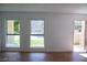 Living room with tile floors and multiple windows at 3937 S Torrey Pines Dr, Las Vegas, NV 89103