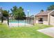 Community pool with adjacent covered patio area at 3937 S Torrey Pines Dr, Las Vegas, NV 89103