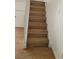 Modern staircase with wood-look laminate treads at 3937 S Torrey Pines Dr, Las Vegas, NV 89103