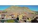 Aerial view of townhouses with mountain backdrop at 3975 N Hualapai Way # 293, Las Vegas, NV 89129