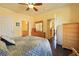 Spacious bedroom with ceiling fan and hardwood floors at 3975 N Hualapai Way # 293, Las Vegas, NV 89129