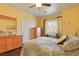 Spacious bedroom with king-size bed and hardwood floors at 3975 N Hualapai Way # 293, Las Vegas, NV 89129