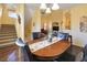 Dining room showcasing an inviting wooden table and stairwell at 3975 N Hualapai Way # 293, Las Vegas, NV 89129