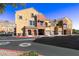 View of well maintained townhomes from the street at 3975 N Hualapai Way # 293, Las Vegas, NV 89129