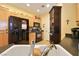 Modern kitchen with black appliances and light wood cabinets at 3975 N Hualapai Way # 293, Las Vegas, NV 89129