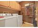 Laundry room with washer, dryer, and ample storage at 3975 N Hualapai Way # 293, Las Vegas, NV 89129