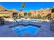 Inviting community pool and spa area with lounge chairs at 3975 N Hualapai Way # 293, Las Vegas, NV 89129