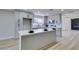 Modern kitchen with gray cabinets and island at 3994 Avonwood Ave, Las Vegas, NV 89121