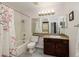 Bathroom with shower/tub combo, vanity, and laundry access at 4050 Pacific Harbors Dr # 246, Las Vegas, NV 89121