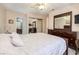 Comfortable bedroom with a queen-size bed and ensuite bathroom access at 4050 Pacific Harbors Dr # 246, Las Vegas, NV 89121