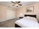 Simple bedroom with a full-size bed and ceiling fan at 4050 Pacific Harbors Dr # 246, Las Vegas, NV 89121