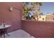 Private patio with a small table and views of the community at 4050 Pacific Harbors Dr # 246, Las Vegas, NV 89121