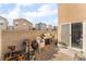 Small backyard with gravel patio and grill at 4129 Chamisa Cove St, Las Vegas, NV 89115