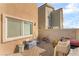 Small backyard with toys and seating at 4129 Chamisa Cove St, Las Vegas, NV 89115