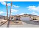 Single-story house with desert landscaping and a two-car garage at 429 Nancy Dr, Henderson, NV 89015