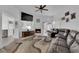 Relaxing living room with a fireplace and a large TV at 429 Nancy Dr, Henderson, NV 89015