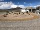 Newly planted desert landscaping with mountain view at 4351 W Bell Vista Ave, Pahrump, NV 89060