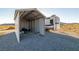 Metal RV storage shed with gravel area for RV parking at 4351 W Bell Vista Ave, Pahrump, NV 89060