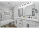 Modern bathroom with double vanity and marble tile at 4431 El Cebra Way, Las Vegas, NV 89121